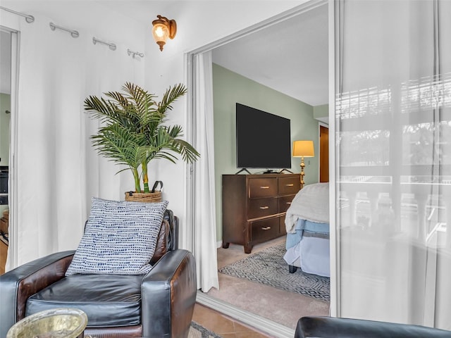 1250 S Pinellas Ave Unit 207, Tarpon Springs, FL 34689 - sitting room featuring tile patterned flooring and carpet flooring