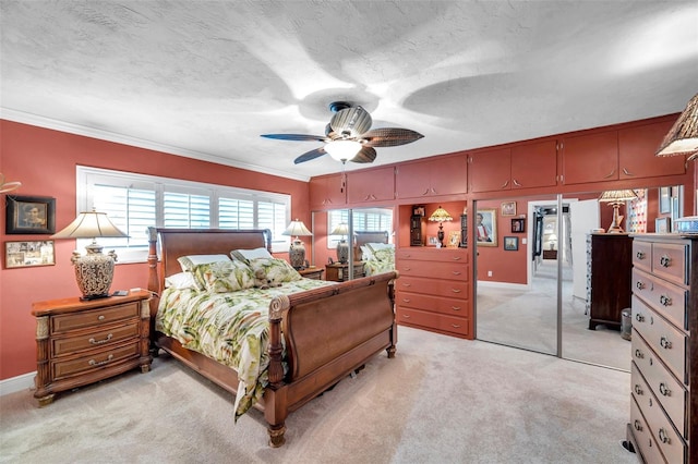 3898 49th Ave S, Saint Petersburg, FL 33711 - bedroom featuring light carpet, crown molding, and a ceiling fan
