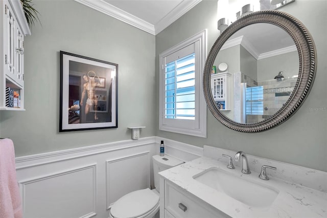 3898 49th Ave S, Saint Petersburg, FL 33711 - full bath featuring ornamental molding, vanity, tiled shower, wainscoting, and a decorative wall