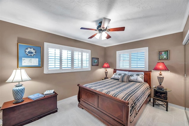3898 49th Ave S, Saint Petersburg, FL 33711 - carpeted bedroom with crown molding and a ceiling fan