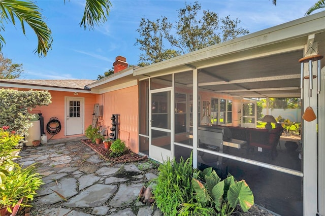 3898 49th Ave S, Saint Petersburg, FL 33711 - doorway to property featuring a chimney