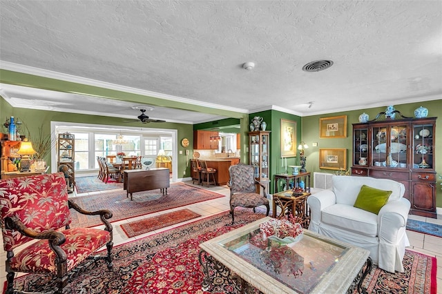 3898 49th Ave S, Saint Petersburg, FL 33711 - tiled living room with ornamental molding, a textured ceiling, and a ceiling fan