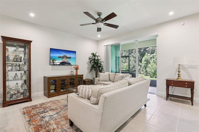 5808 Grand Sonata Ave, Lutz, FL 33558 - living room with ceiling fan, recessed lighting, and light tile patterned floors