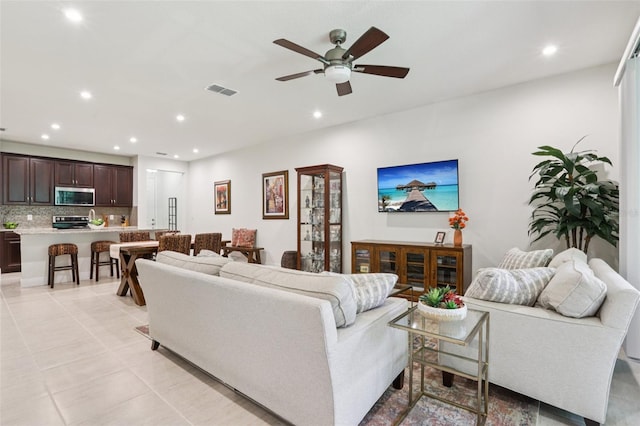 5808 Grand Sonata Ave, Lutz, FL 33558 - living area with recessed lighting, a ceiling fan, and light tile patterned floors