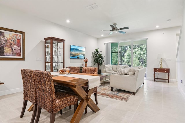 5808 Grand Sonata Ave, Lutz, FL 33558 - dining area with a ceiling fan, recessed lighting, and light tile patterned floors