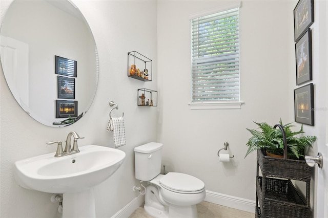 5808 Grand Sonata Ave, Lutz, FL 33558 - half bathroom featuring baseboards