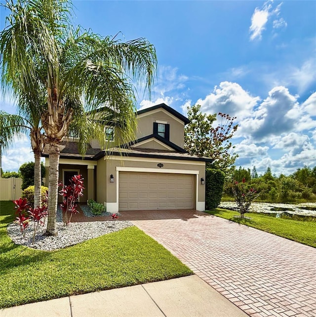 19636 Long Lake Ranch Blvd, Lutz, FL 33558 - traditional-style house featuring stucco siding and decorative driveway