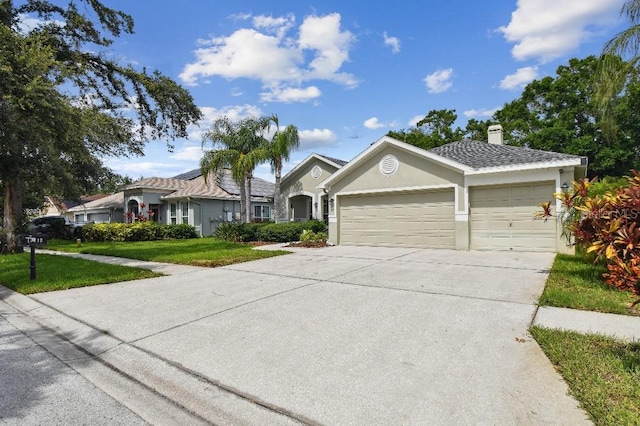 15217 Octavia Ln, Odessa, FL 33556 - single story home featuring a garage, concrete driveway, a front yard, a chimney, and stucco siding