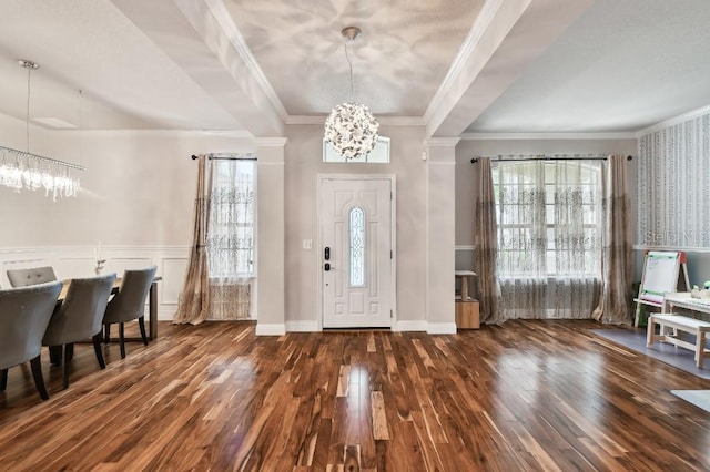 15217 Octavia Ln, Odessa, FL 33556 - entryway featuring a chandelier, hardwood / wood-style flooring, ornamental molding, and a wainscoted wall