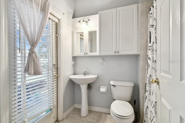 15217 Octavia Ln, Odessa, FL 33556 - bathroom with tile patterned floors and baseboards