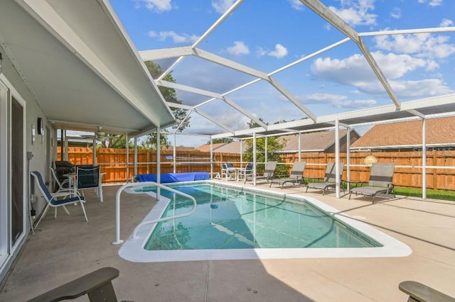 12413 Dawn Vista Dr, Riverview, FL 33578 - view of pool with a patio area, a fenced backyard, and glass enclosure