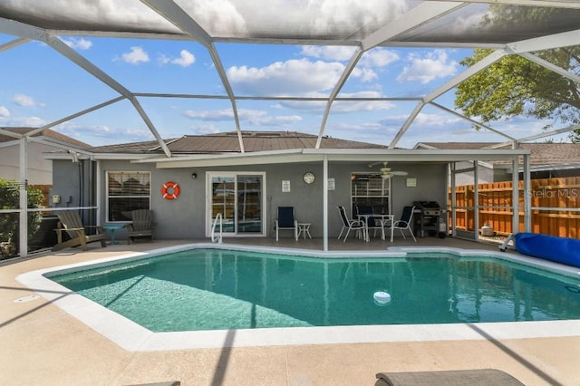 12413 Dawn Vista Dr, Riverview, FL 33578 - view of swimming pool featuring a patio, a lanai, ceiling fan, and grilling area