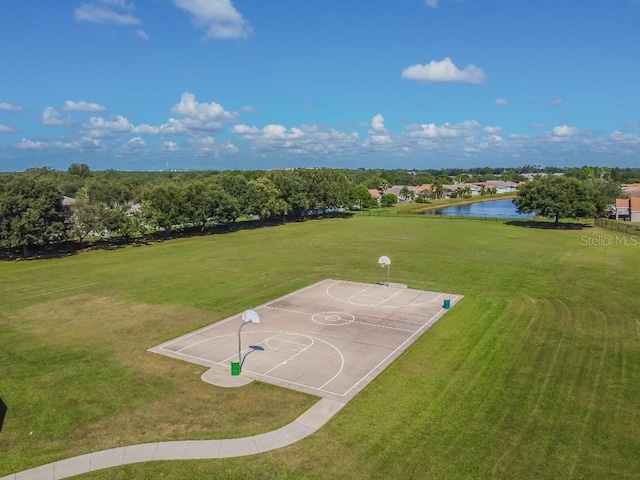 12413 Dawn Vista Dr, Riverview, FL 33578 - view of basketball court featuring community basketball court, a water view, and a lawn