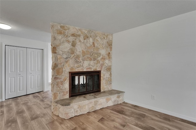 6334 Cocoa Ln, Apollo Beach, FL 33572 - detailed view of wood finished floors and a fireplace