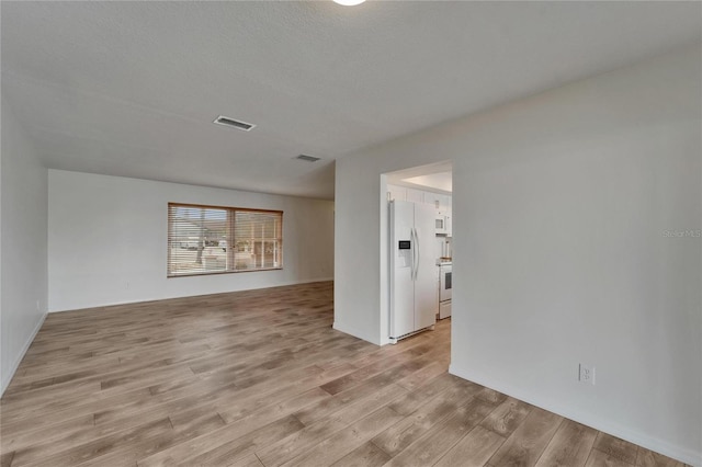 6334 Cocoa Ln, Apollo Beach, FL 33572 - empty room featuring light wood finished floors