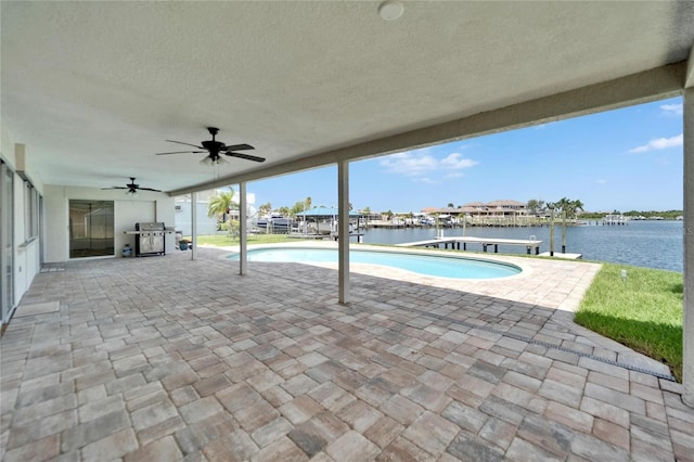 6334 Cocoa Ln, Apollo Beach, FL 33572 - swimming pool with area for grilling, a patio area, a water view, and a ceiling fan