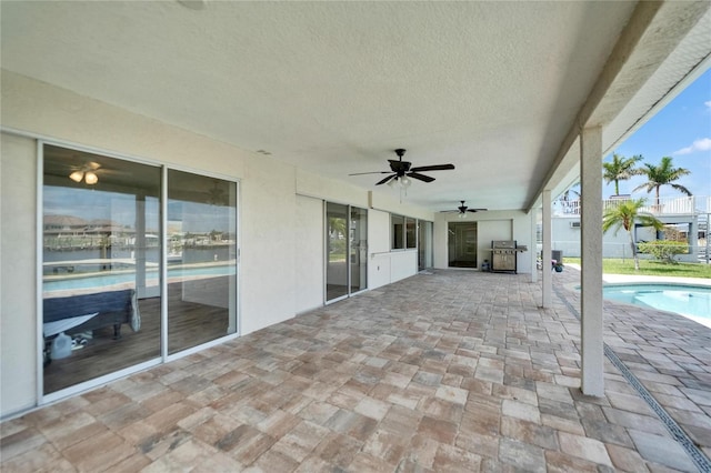 6334 Cocoa Ln, Apollo Beach, FL 33572 - view of patio / terrace featuring ceiling fan and grilling area
