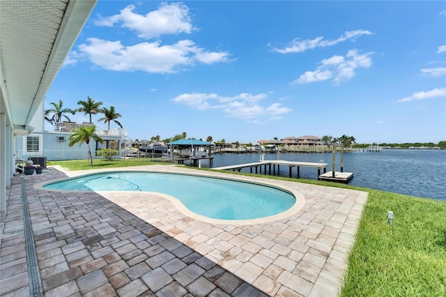 6334 Cocoa Ln, Apollo Beach, FL 33572 - outdoor pool featuring a boat dock, a patio, and a water view