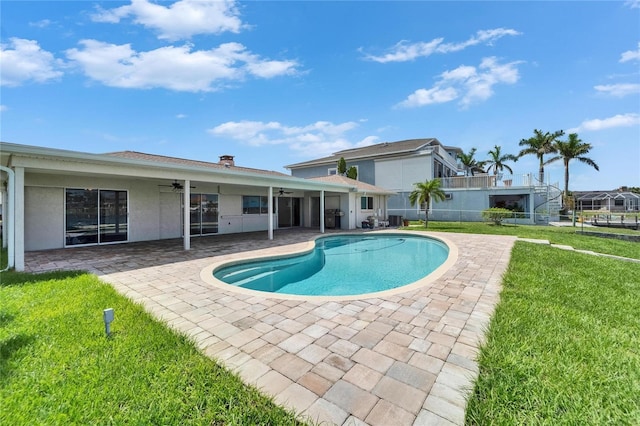 6334 Cocoa Ln, Apollo Beach, FL 33572 - swimming pool featuring ceiling fan and a patio