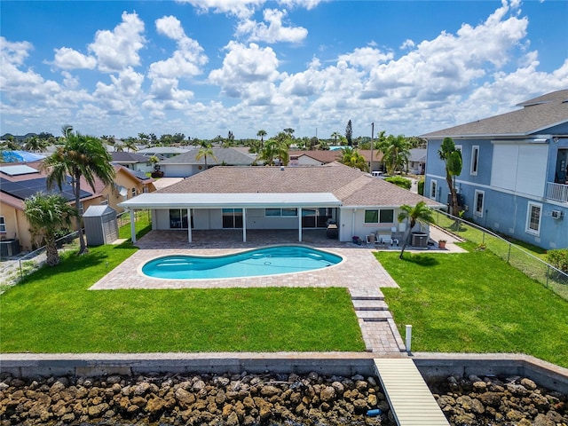 6334 Cocoa Ln, Apollo Beach, FL 33572 - view of pool featuring a patio area, a fenced backyard, and a residential view