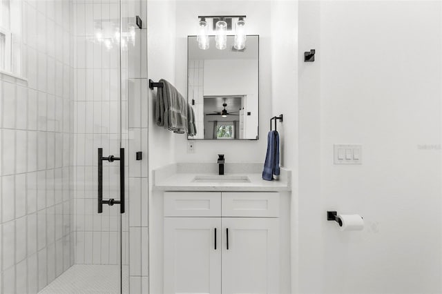 1275 Palm St, Clearwater, FL 33755 - bathroom with a stall shower, vanity, and a ceiling fan