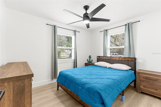 1275 Palm St, Clearwater, FL 33755 - bedroom featuring light wood-style floors and ceiling fan