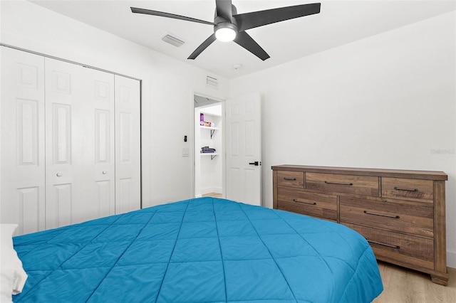 1275 Palm St, Clearwater, FL 33755 - bedroom featuring wood finished floors, a closet, and ceiling fan