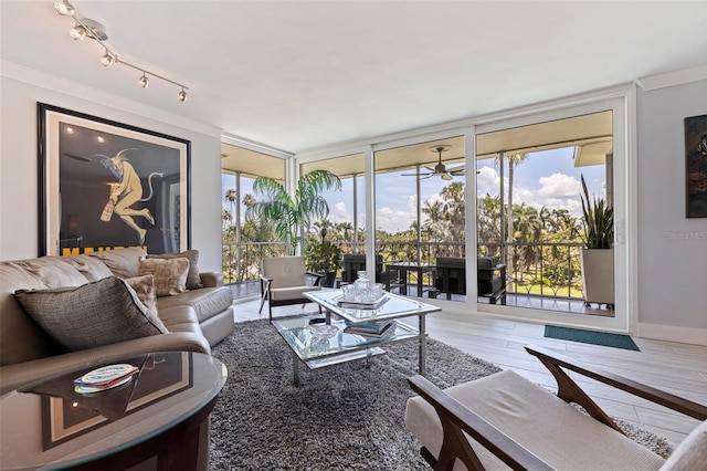 1060 N Shore Dr NE Unit 6, Saint Petersburg, FL 33701 - living room featuring expansive windows and ornamental molding