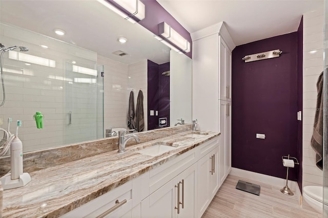 1060 N Shore Dr NE Unit 6, Saint Petersburg, FL 33701 - full bath with double vanity, a stall shower, and recessed lighting