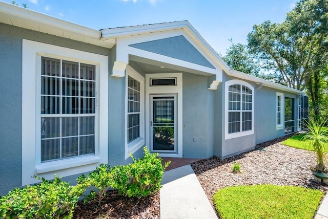 6044 Sandhill Ridge Dr, Lithia, FL 33547 - entrance to property featuring stucco siding