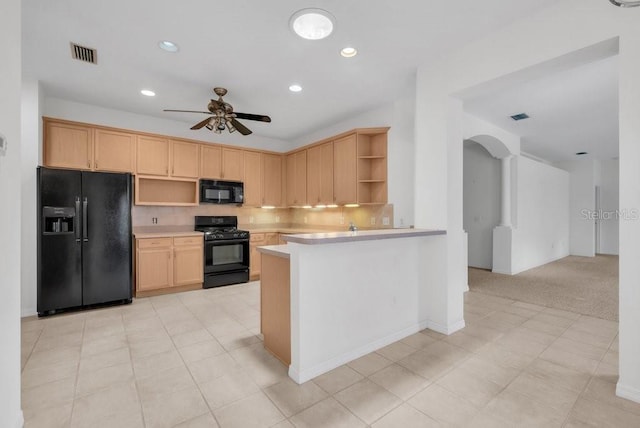 6044 Sandhill Ridge Dr, Lithia, FL 33547 - kitchen with black appliances, open shelves, light countertops, tasteful backsplash, and recessed lighting
