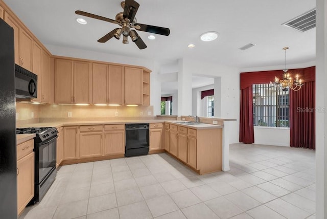 6044 Sandhill Ridge Dr, Lithia, FL 33547 - kitchen with black appliances, light brown cabinets, a chandelier, a peninsula, and light countertops