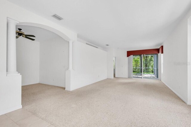 6044 Sandhill Ridge Dr, Lithia, FL 33547 - carpeted spare room with decorative columns and ceiling fan