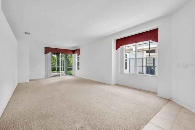 6044 Sandhill Ridge Dr, Lithia, FL 33547 - unfurnished room featuring tile patterned flooring