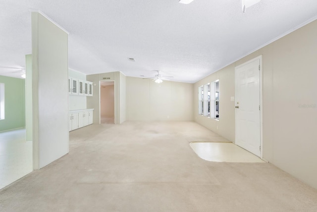 8443 Fantasia Park Way, Riverview, FL 33578 - unfurnished living room with a ceiling fan and light colored carpet