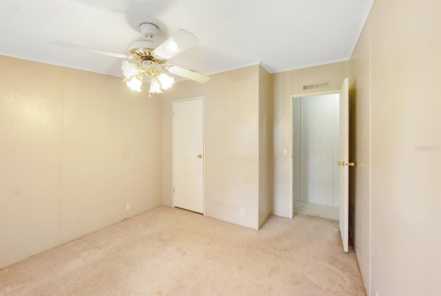 8443 Fantasia Park Way, Riverview, FL 33578 - unfurnished bedroom with light colored carpet, crown molding, and a ceiling fan