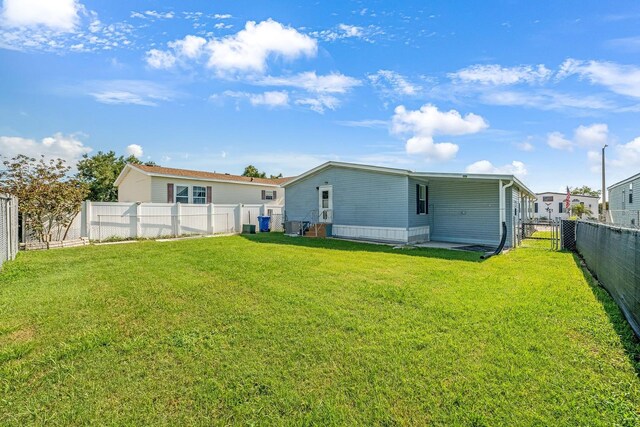 8443 Fantasia Park Way, Riverview, FL 33578 - rear view of property with a fenced backyard