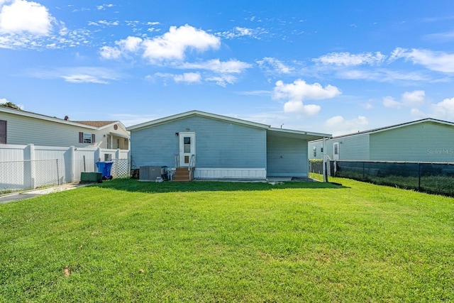 8443 Fantasia Park Way, Riverview, FL 33578 - back of house with entry steps and a fenced backyard
