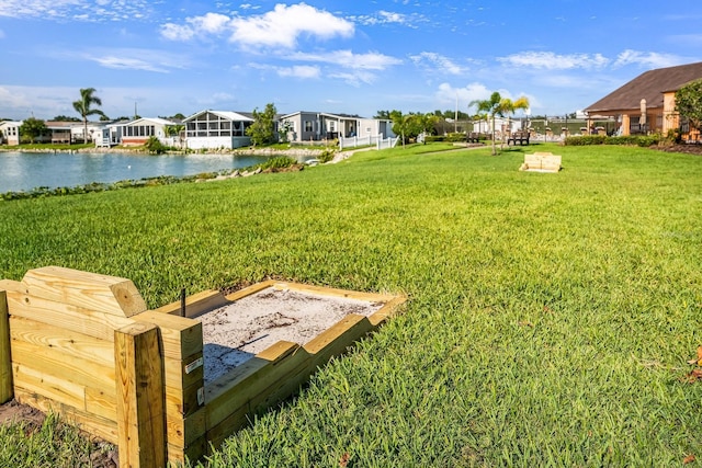 8443 Fantasia Park Way, Riverview, FL 33578 - view of grassy yard with a water view and a residential view