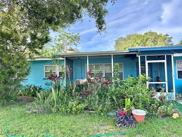 1605 Logan St, Clearwater, FL 33755 - view of front of property featuring stucco siding