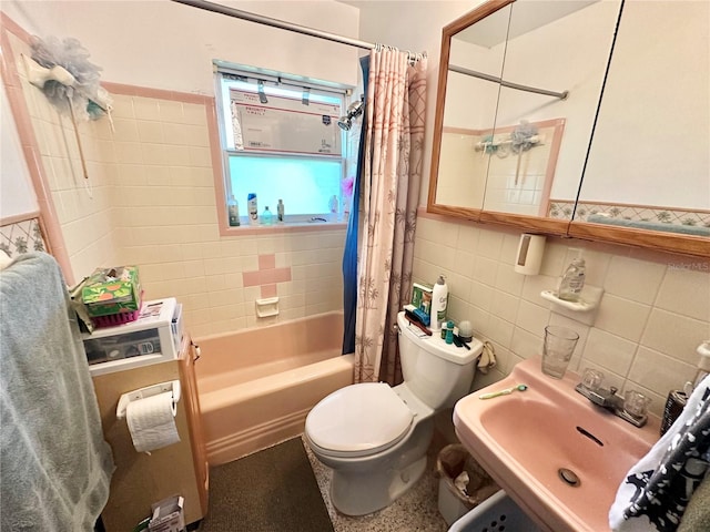 1605 Logan St, Clearwater, FL 33755 - full bathroom with tile walls and shower / tub combo with curtain