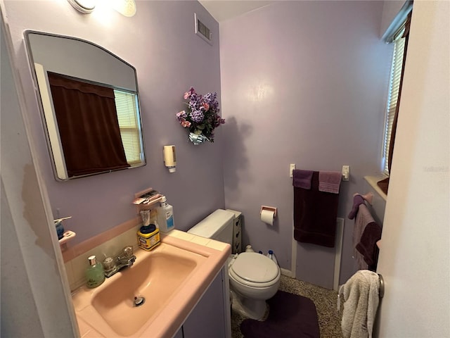 1605 Logan St, Clearwater, FL 33755 - bathroom with toilet and vanity