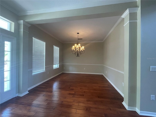 405 Islebay Dr, Apollo Beach, FL 33572 - unfurnished dining area featuring a chandelier, ornamental molding, dark wood-style floors, and plenty of natural light