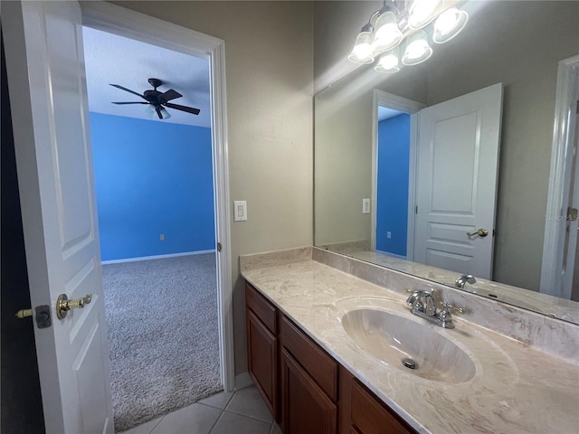 405 Islebay Dr, Apollo Beach, FL 33572 - bathroom with vanity, a ceiling fan, and tile patterned flooring