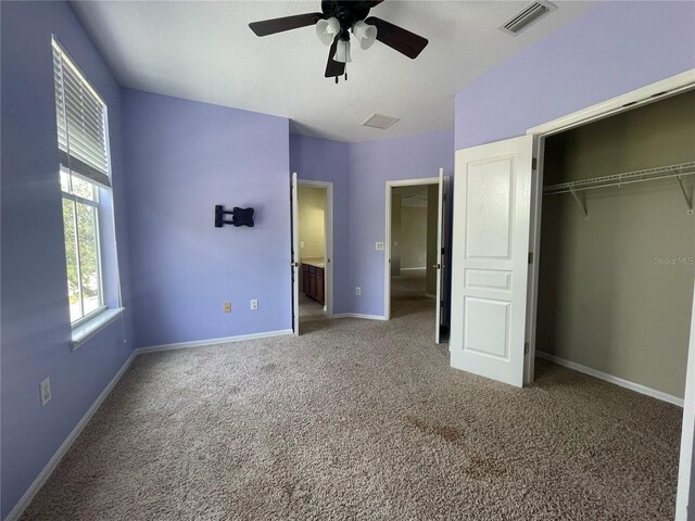 405 Islebay Dr, Apollo Beach, FL 33572 - unfurnished bedroom featuring carpet flooring, a closet, and ceiling fan