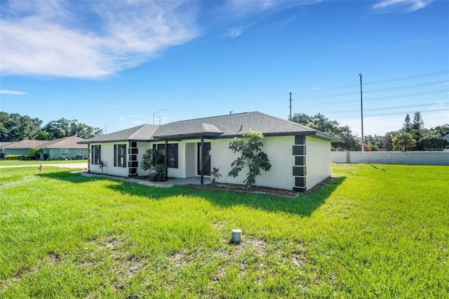 2151 Groveglen Ln S, Lakeland, FL 33813 - rear view of property featuring stucco siding