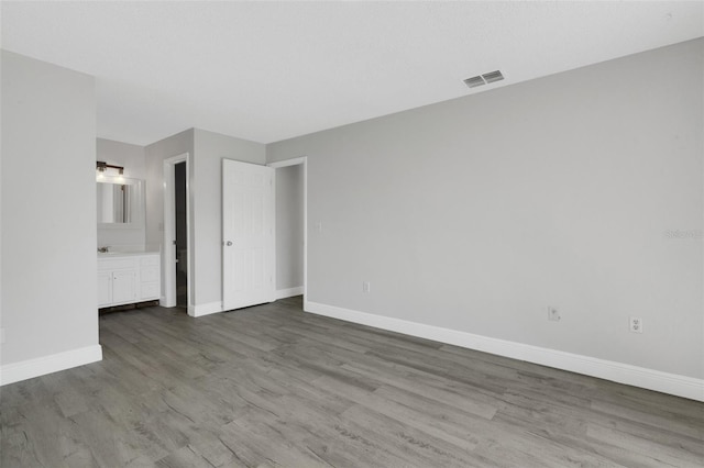 2151 Groveglen Ln S, Lakeland, FL 33813 - empty room featuring baseboards and wood finished floors