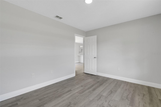 2151 Groveglen Ln S, Lakeland, FL 33813 - empty room with wood finished floors