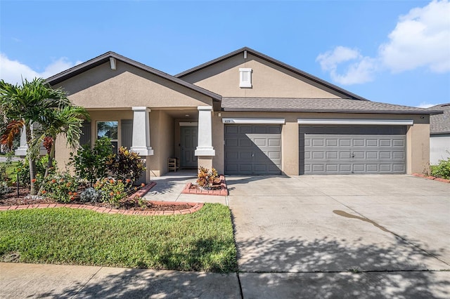 10211 Cakebread Ln, Riverview, FL 33578 - view of front of house with stucco siding, driveway, a garage, and a front lawn