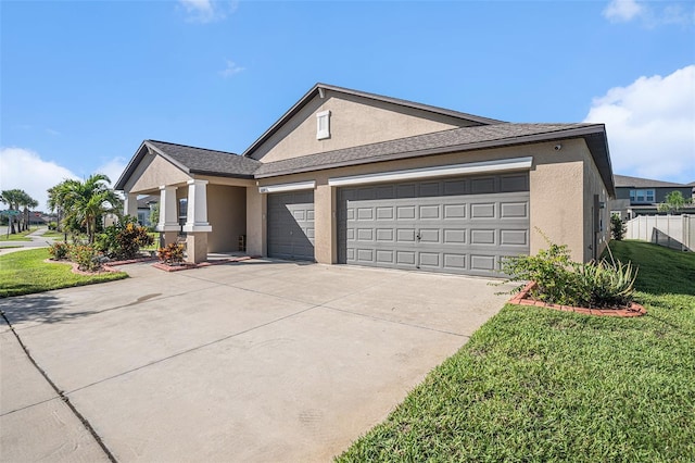 10211 Cakebread Ln, Riverview, FL 33578 - ranch-style home with stucco siding, concrete driveway, and a garage